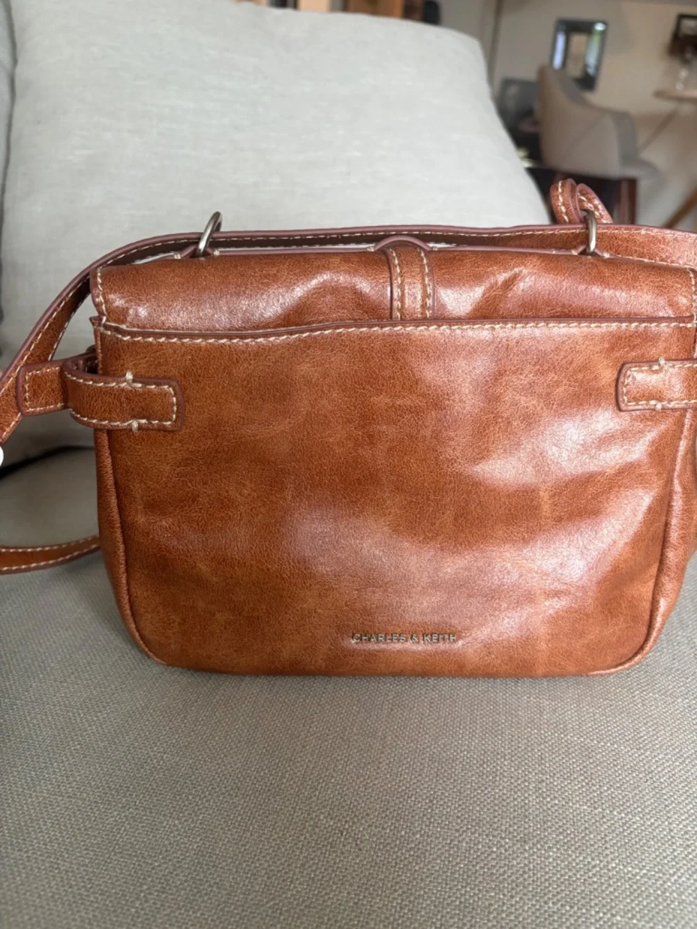 CHARLES & KEITH Delfina Chain Crossbody Bag in Distressed Tan